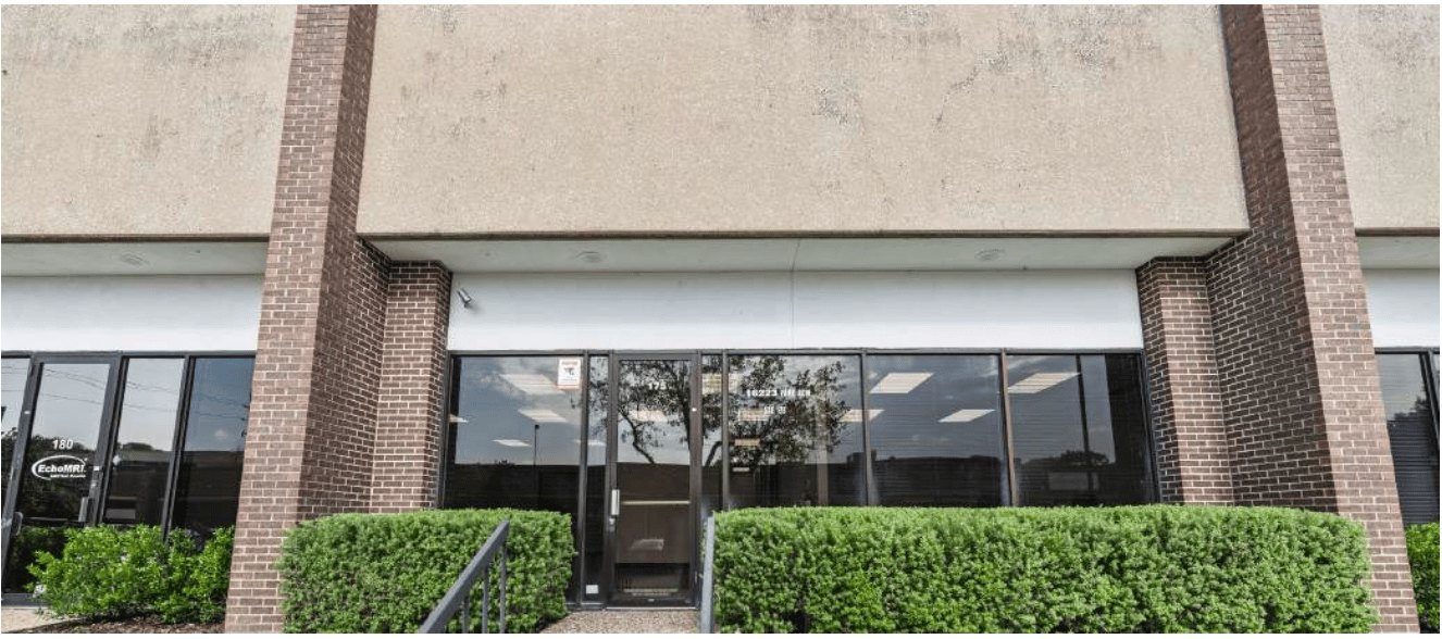 Flex building entrance — Techniplex Business Center suite frontage, 16223 Park Row