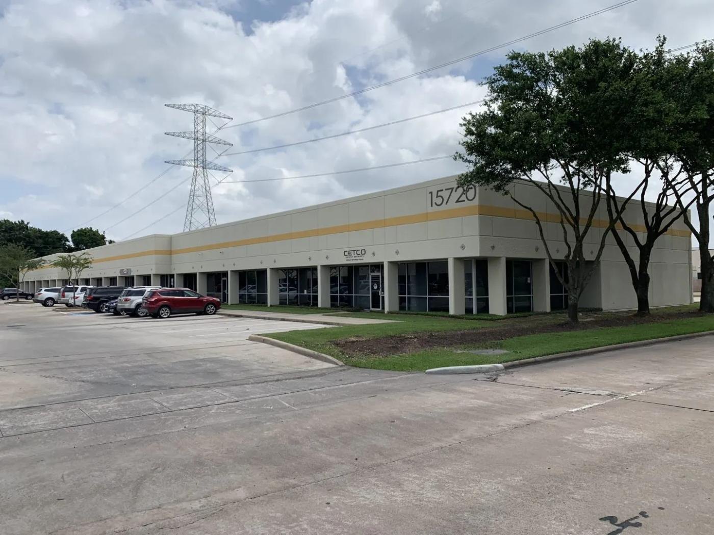 Flex office-industrial building exterior — Park Ten Business Park, address 15720 visible