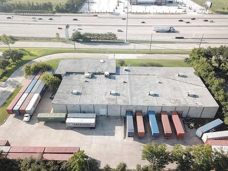Aerial — warehouse with truck court and trailers, 15330 Park Row whole-building listing